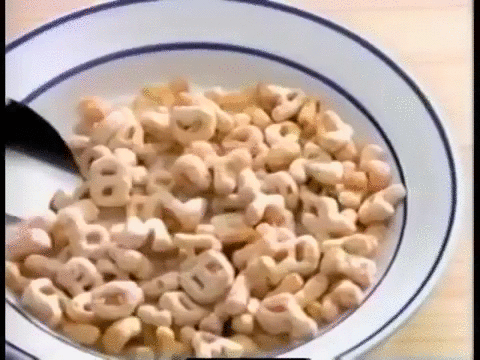 Alphabet cereal with milk in a bowl