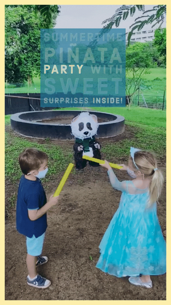 kids hitting piñata outdoors