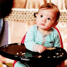 baby distracted and in awe